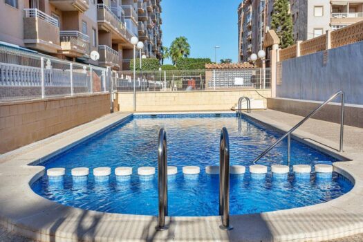 2 bedroom house with pool, garage and storage room