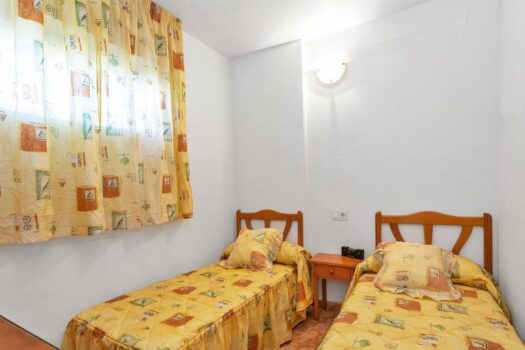 2 bedroom house with pool, garage and storage room