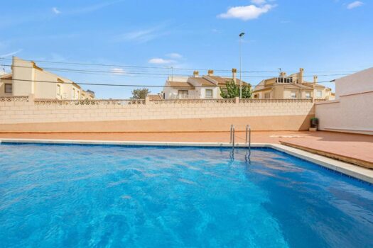 Cozy corner apartment with communal pool ideal for families and investors